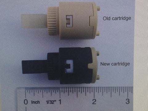 Old and new Genuine Replacement 25mm Cartridge Sub Assembly for Avalon Treviso 26 529 Series Faucets next to ruler