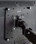 Back view of Built Tough VESA Adapter Bracket For TVs And Monitors Max 42 Inches mounted on a monitor, showcasing steel construction and design.