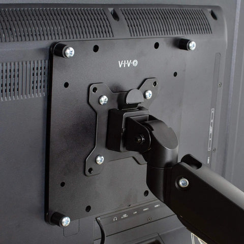 Back view of Built Tough VESA Adapter Bracket For TVs And Monitors Max 42 Inches mounted on a monitor, showcasing steel construction and design.