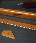 Pro Grade Fret Leveling Kit with Fret Rocker, String Height Gauge, Notched Straight Edge, 16 Inch Sanding Beam on black surface