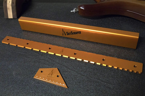 Pro Grade Fret Leveling Kit with Fret Rocker, String Height Gauge, Notched Straight Edge, 16 Inch Sanding Beam on black surface