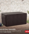 71 Gallon Outdoor Resin Storage Box For Patio Cushions And Throw Pillows, shown as a brown chest on a wooden deck with plants.