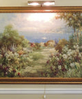 Advent 14 Inch Antique Brass Picture Light with corded on off switch illuminating framed painting on gallery wall