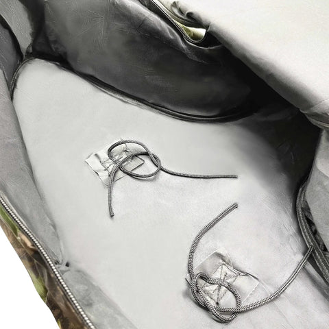 Internal view of the Rugged Crossbow Case With Backpack Straps For Hunting, 600D Nylon, showing internal straps for secure gear.