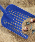 Sand Dipper Treasure Shovel Digger Sifter For Beach Cleanup And Barn Chores, rugged plastic scoop with shells on sand