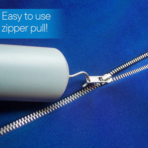 Button Hook With Zipper Pull No Fuss Dressing Aid With Comfort Grip Handle For Limited Hand Dexterity, Makes Buttoning And Zipping Clothes A Breeze Every Day. Grey handle pulling a zipper on blue fabric.