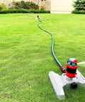 Six Pattern Rotary Sprinkler With Metal Base And Quiet Operation Adjustable Coverage From Five To Three Hundred Sixty Degrees Flow Through Design For Lawn Watering Quick Connect Starter Set Included on a green lawn