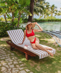 Woman lounging on a Two Pack California Style Chaise Lounge Cover Towels With Pockets Striped 100 Percent Cotton Cabana Covers For Beach Pool Outdoor Chairs 30 By 85 Inches Beige