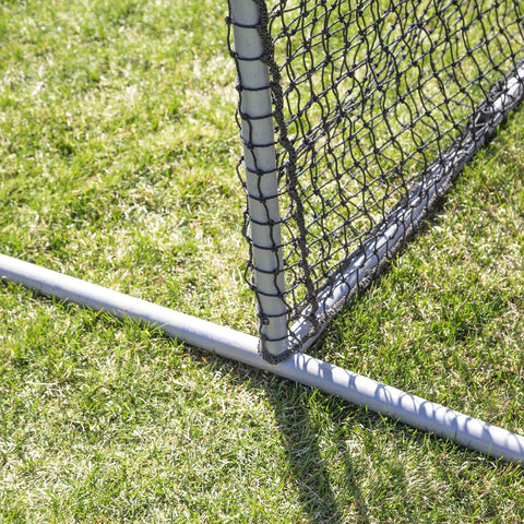 Close-up of 6Ft Black L Screen For Baseball And Softball Batting Practice With UV Treated Net And Steel Frame corner detail on grass.