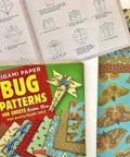 Bug Pattern Origami Paper Pack With 100 Sheets In 6 Inch Size 15 Cm Printed With 8 Different Bug Designs and project instructions.