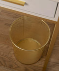 Ryder Gold Mesh Metal Trash Can 4.5 Gallon Office Wastebasket with Non Slip Feet next to a desk on wooden floor