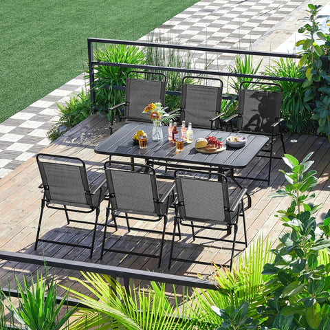 Outdoor Folding Patio Chairs Set Of 4 For The Backyard And Porch, around a table on a wooden deck, in a garden setting