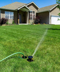 In Ground Impact Sprinkler With Click N Go Hose Connect for Quick Install Lawn Irrigation in action on a green lawn