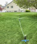 Effortless Above Ground All In One Sprinkler System For Lawn Kit Portable Yard Watering Solution No Digging Needed on a lawn
