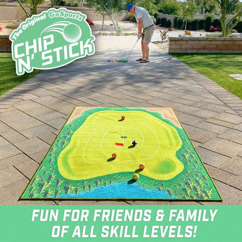 Person playing with Chip N Stick Golf Game Kit With 1 Chip N Stick Mat, 16 Balls, And Chipping Mat For 1 To 4 Players, Indoor Or Outdoor Practice