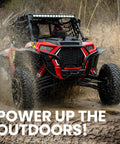 Off-road vehicle driving through muddy terrain with text 'Power Up the Outdoors' displayed at the bottom.