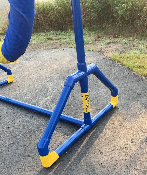 Endurance Agility Tire Jump for Dogs With Lightweight PVC Frame for Indoor or Outdoor Training Standard Tire Included Tough Built A Frame Setup for All Size Dogs Dog Agility Equipment showing sturdy PVC frame on pavement.