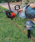 2 In 1 Electric Lawn Edger And Trencher With 12 Amp Corded Power, 7.5 Inch Cutting Width in use along sidewalk edge