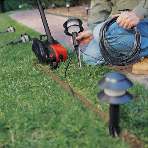 2 In 1 Electric Lawn Edger And Trencher With 12 Amp Corded Power, 7.5 Inch Cutting Width in use along sidewalk edge