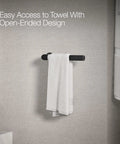 Avid Towel Arm Matte Black Open Ended Design For Easy Access Premium Metal Construction with towel hanging on bathroom wall