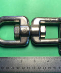 Marine Grade Stainless Steel 316 Anchor Swivel Featuring Heavy Duty Eye And Jaw One Half Inch Thick Rust Proof Marine Hardware Built Tough As Nails To Handle 2750 Pounds While Spinning Butter Smooth For Zero Messy Lines All Day Long, close-up view with ruler for size reference.