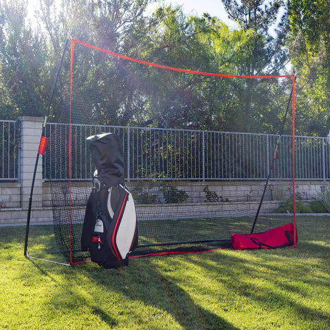 Portable 10x7ft Golf Practice Net With Carry Bag set up in backyard with golf bag beside sturdy frame, for indoor outdoor training