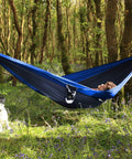 Two Person Double Camping Hammock With Lightweight Parachute Nylon 210T Includes Tree Straps And Carabiners in forest setting
