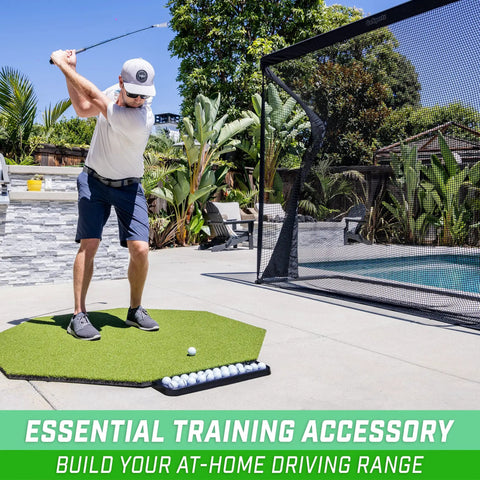 Golfer using All Weather Golf Ball Tray For Hitting Mats 24 Ball Capacity Universal Fit That Locks Under Any Mat