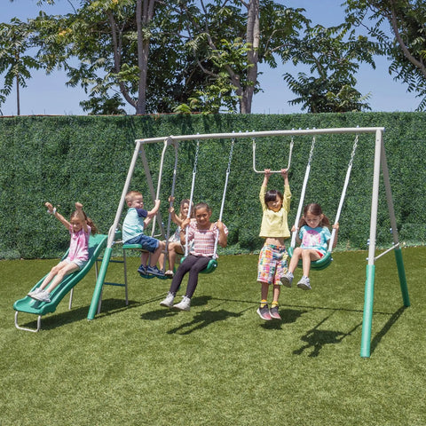 Outdoor Backyard Playset With 2 Swings, Glide Ride, Trapeze And 5Ft Wave Slide, Vinyl Coated Chains on lawn setting