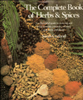 Cover of The Complete Book of Herbs & Spices with assorted ingredients like spices and herbs.