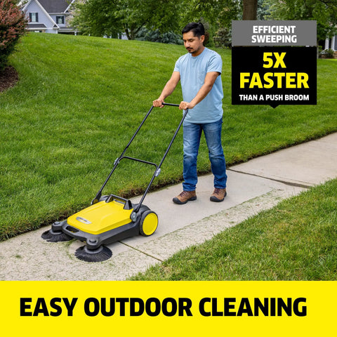 Person using Walk Behind Outdoor Push Sweeper S 4 Twin for Workshops and Garages Cleans Up to 5 Times Faster Than a Broom on sidewalk