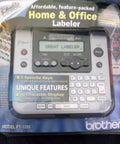 P-Touch Label Maker Electronic Labeling System For Home Office And Outdoor Use in retail packaging with 15-character display visible.