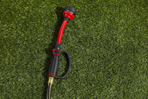 Pro Flo 14 Inch 7 Pattern Watering Wand With Thumb Control displayed on grass
