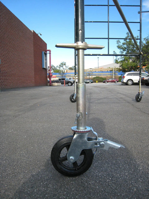 Heavy Duty 8 Inch Rubber Scaffold Caster Wheels Set Of Four Rock Solid Swivel Casters With Dual Brakes And Greaseable Bearings Built Tough For The Daily Grind 800 Lb Capacity mounted on scaffold.