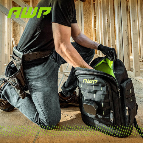 Worker using Rugged Extreme Tool Backpack Built For The Jobsite With Water Resistant Molded Base Pro Grade Durable Polyester Construction