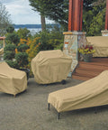 Outdoor furniture covered by Terrazzo Water Resistant 24 Inch Round Ottoman And Coffee Table Cover For Outdoor Use No Fuss All Weather Protector Weatherproof Rain Tite Fabric Shields Against Rain Snow And Dirt Fits 24 Inch Round Ottomans Or Coffee Tables One Year Warranty on a patio.