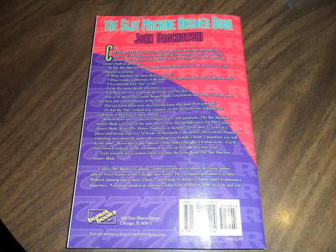 Back cover of The Slot Machine Answer Book by John Grochowski showcasing casino insights and strategies.