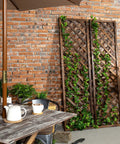 Wood Trellis Wall Hanging For Climbing Plants, Large Outdoor Garden Lattice Panels In Brown, Set Of Two against brick wall