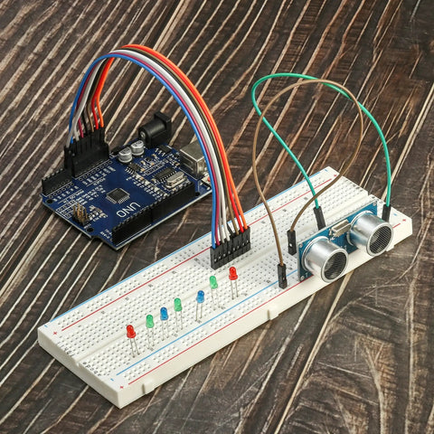 Solderless Prototype Breadboard Kit With 1x830 Tie In Grid, 2x400 Tie Points, And 6x170 Tie Points assembled with electronic components.