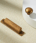 20 Pack Antique Brass Cabinet Cup Pulls Set With 3 Inch Center Retro Vibe Vintage Drawer Handles And Knobs on textured surface