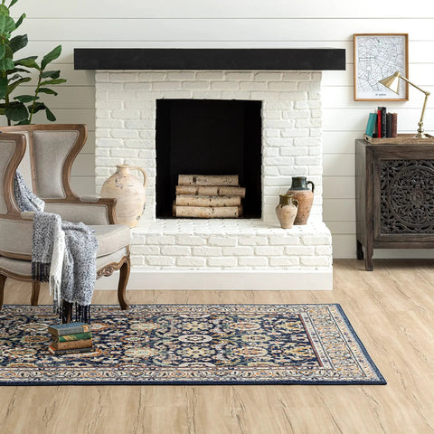 Living room with fireplace displaying Non Slip Rug Pad Gripper For Area Rugs 1 Foot 6 Inch By 2 Foot 6 Inch Ultra Low Profile Anti Skid Under Rug Liner Keeps Rugs In Place On All Floor Surfaces And Makes Vacuuming A Breeze under patterned rug.
