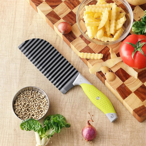 VRUIFA crinkle cutter with yellow non-slip handle on a wooden cutting board beside vegetables and pasta