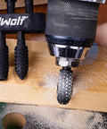 NordWolf 10-piece black rotary burr set with 1/4 in hex shank, shown with drill and wood shavings