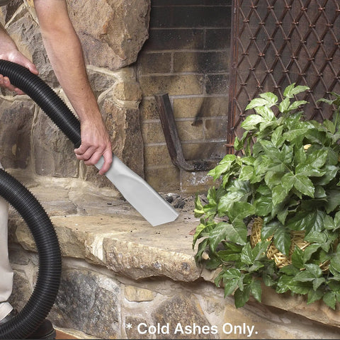 Person using vacuum with HEPA Cartridge Filter For Ash Vacuum - Dry Ash Filtration to clean ashes from fireplace