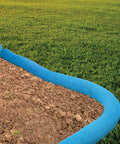Sediment Filter Sock For Erosion Control And Storm Drain Protection, 5 Inch Diameter By 10 Foot Length, blue flexible barrier on soil