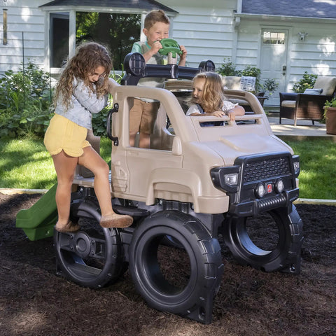 Children playing on Truck Climber Outdoor Playset For Kids, Backyard Playground With Slide And Climbing Wall, Jungle Gym