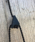3mm Paracord With Textured Posi Lock Ninja Black Color Made In USA Beefy Outdoor Cord With Lock On Wood Background
