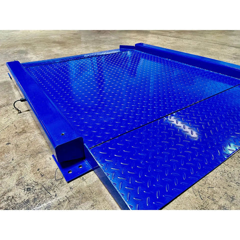 Heavy Duty Low Profile Drum Scale Built Tough With Smooth Hinged Ramps showing blue steel platform for easy barrel rolling.