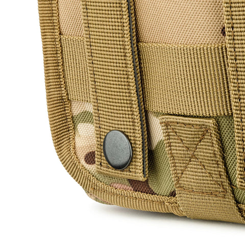 Close-up of Scherber Premium IFAK MOLLE trauma pouch in woodland camouflage with tan webbing and snap button