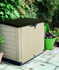 All Weather Heavy Duty Outdoor Storage Shed Made From Resin Plastic For Forty Two Cubic Feet Of Easy Patio Garden Tool Organization In Earthy Brown Shade, 57x32x49 inches.